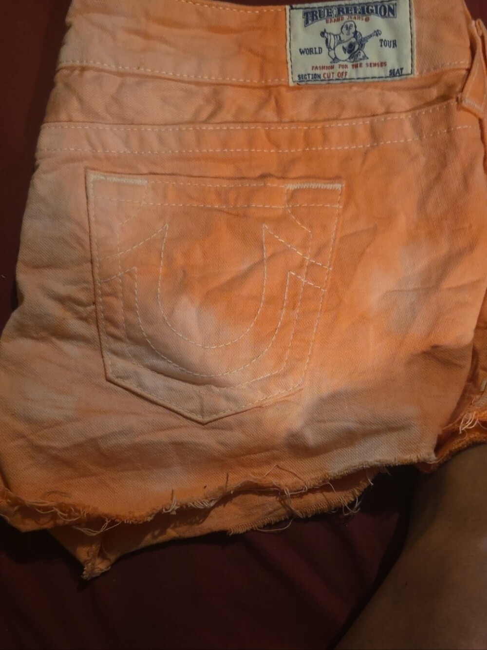True Religion Peach-Orange Distressed Denim Cutoff Shorts